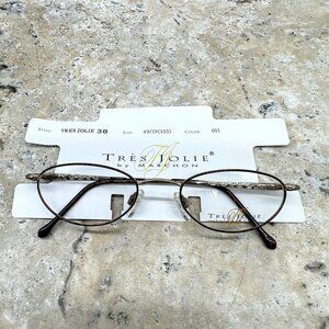 Tres Jolie 38 by Marchon Wine Metal Oval Eyeglasses 49/19 135 Japan Unisex